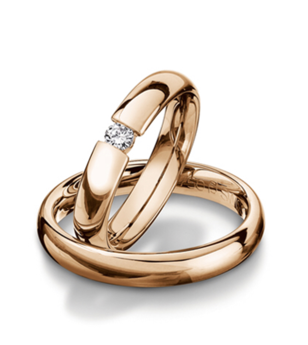 Обручальные кольца с бриллиантом(0,10 ct.) из золота 750 пробы 